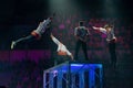 Gymnasts jump on trampoline